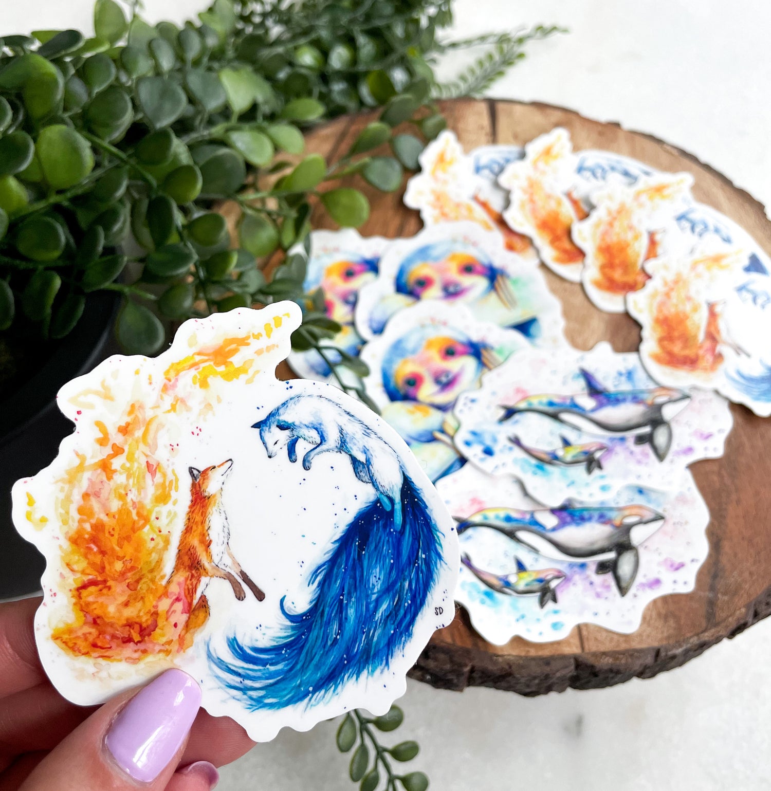 This collection contains all of the waterproof, vinyl, dye-cut stickers with Wild Planet Creations art on them.