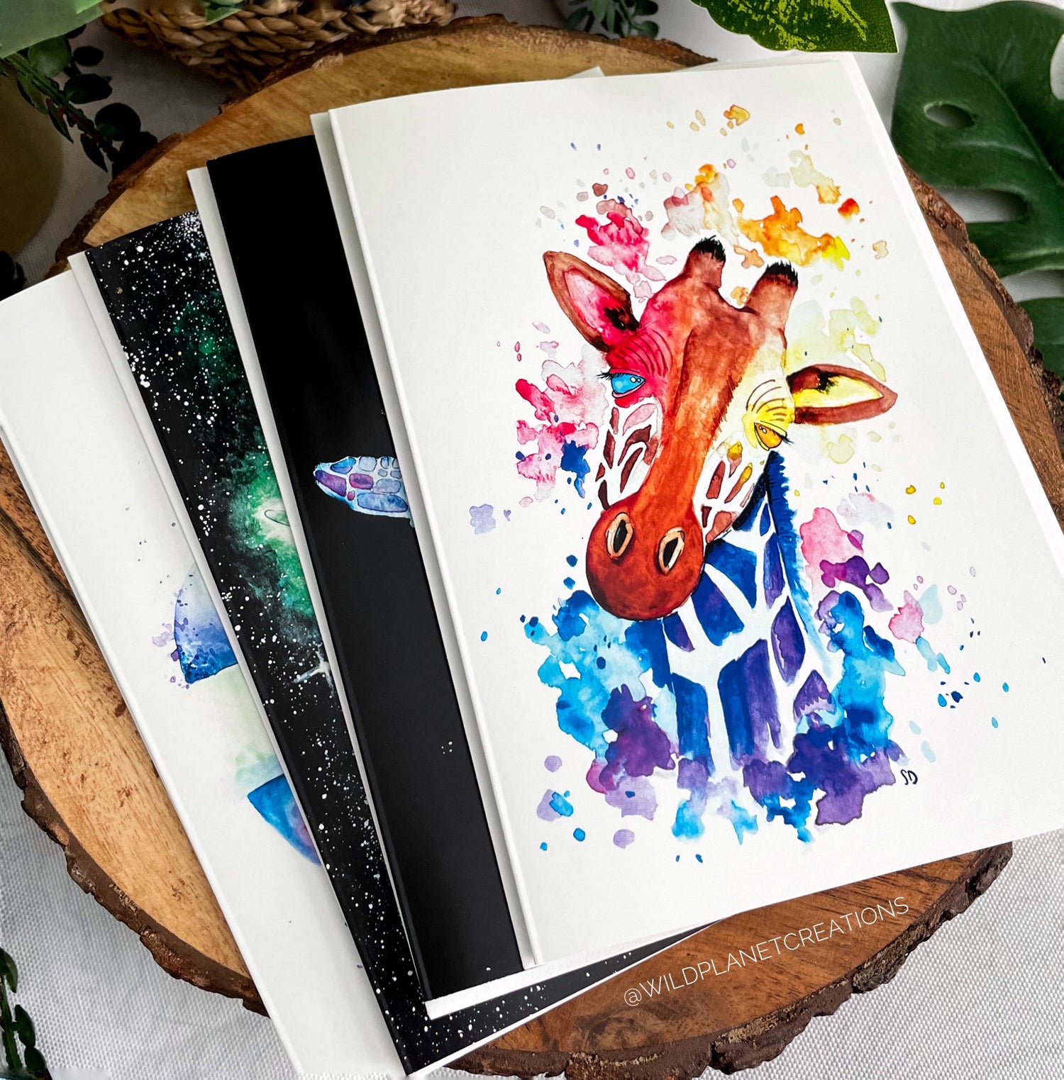 This collection contains all 5x7" eco-friendly greeting cards with Wild Planet Creations watercolor art on them.
