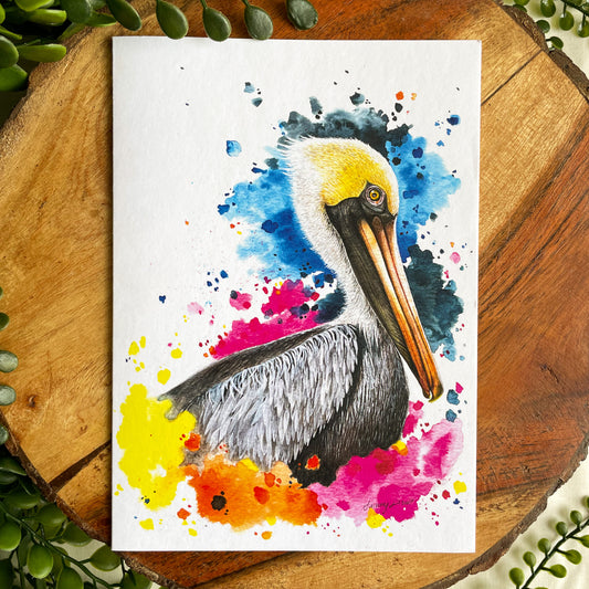 A 5x7" eco-friendly greeting card with original watercolor artwork from the Wild Planet Creations collection depicting a brown pelican.