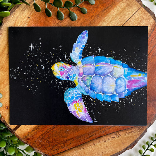 A 5x7" eco-friendly greeting card with original watercolor artwork from the Wild Planet Creations collection depicting a loggerhead sea turtle.
