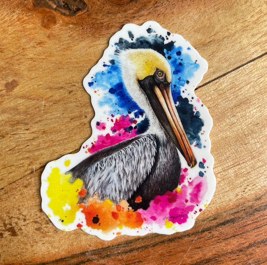 A close-up image of the waterproof, vinyl, dye-cut sticker depicting a watercolor painting from the Wild Planet Creations collection of a brown pelican.